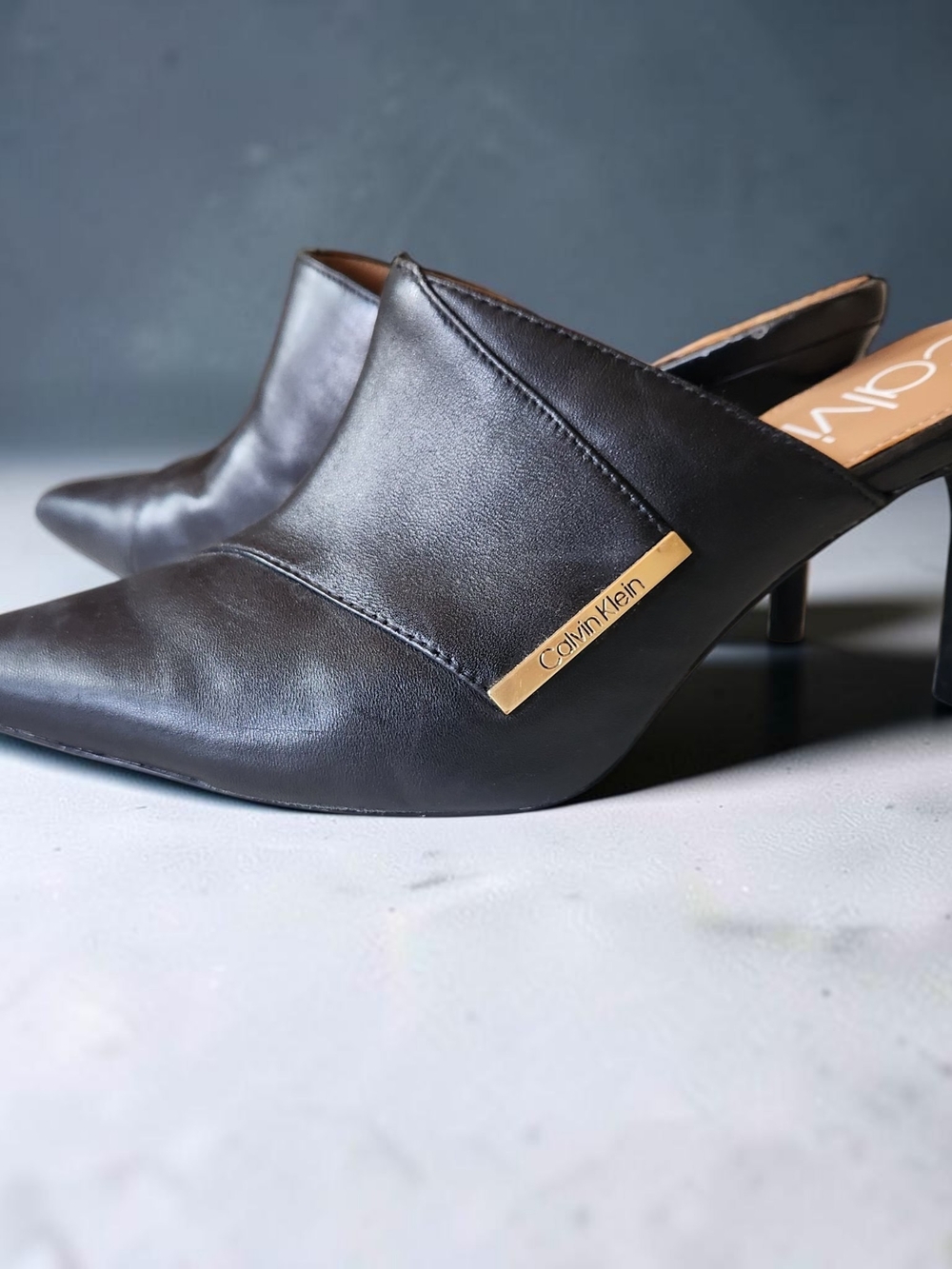 Calvin Klein Black Leather Pointed Slip-On Mule Heels with Gold Logo